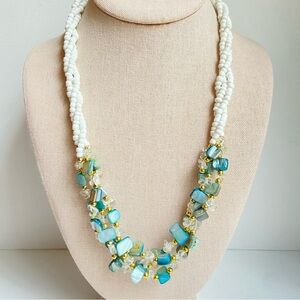 White glass seed bead and aqua dyed shell chunk necklace with goldtone spacers